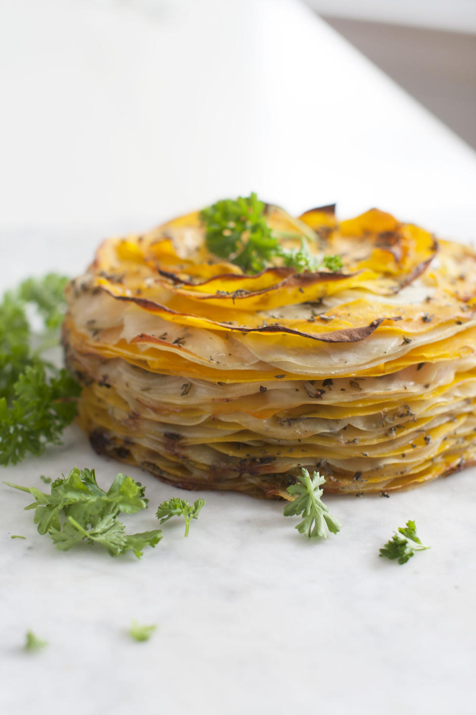 This March 31, 2014 photo shows roasted butternut and herb tart in Concord, N.H. (AP Photo/Matthew Mead)