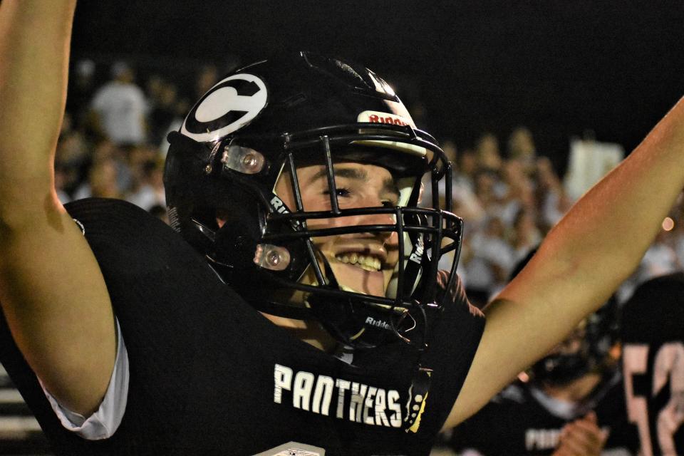 Centralia's Jesse Shannon celebrates after the Panthers force a turnover on downs to seal a 26-20 win over Hallsville on Friday night.