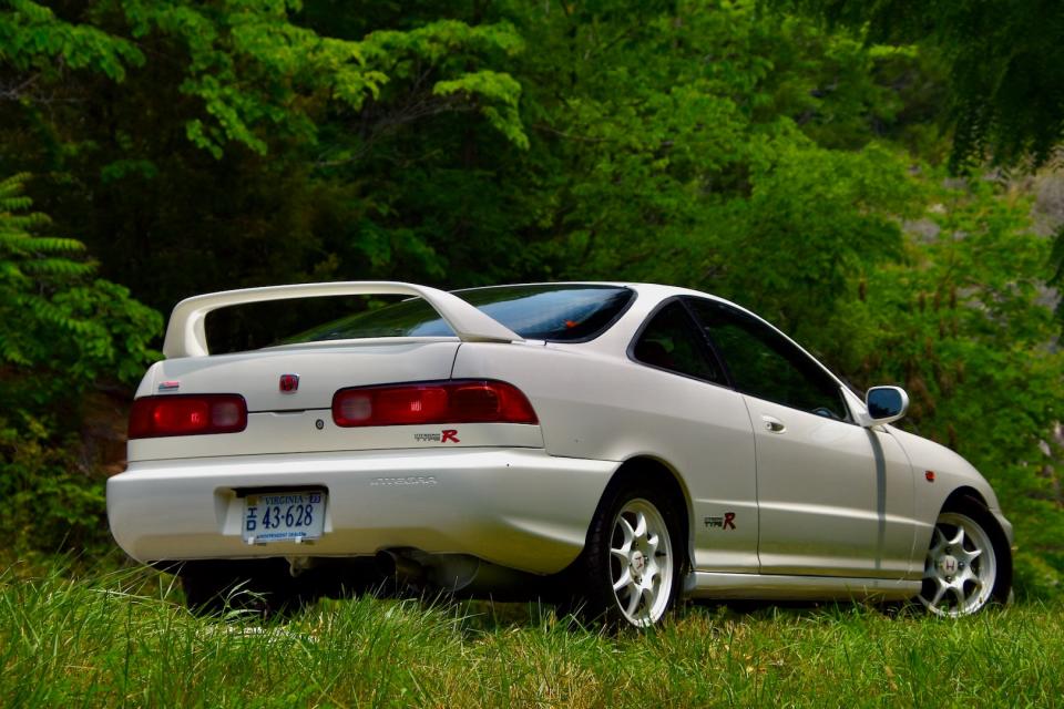 1996 Honda Integra Type R rear three-quarter with a grassy background