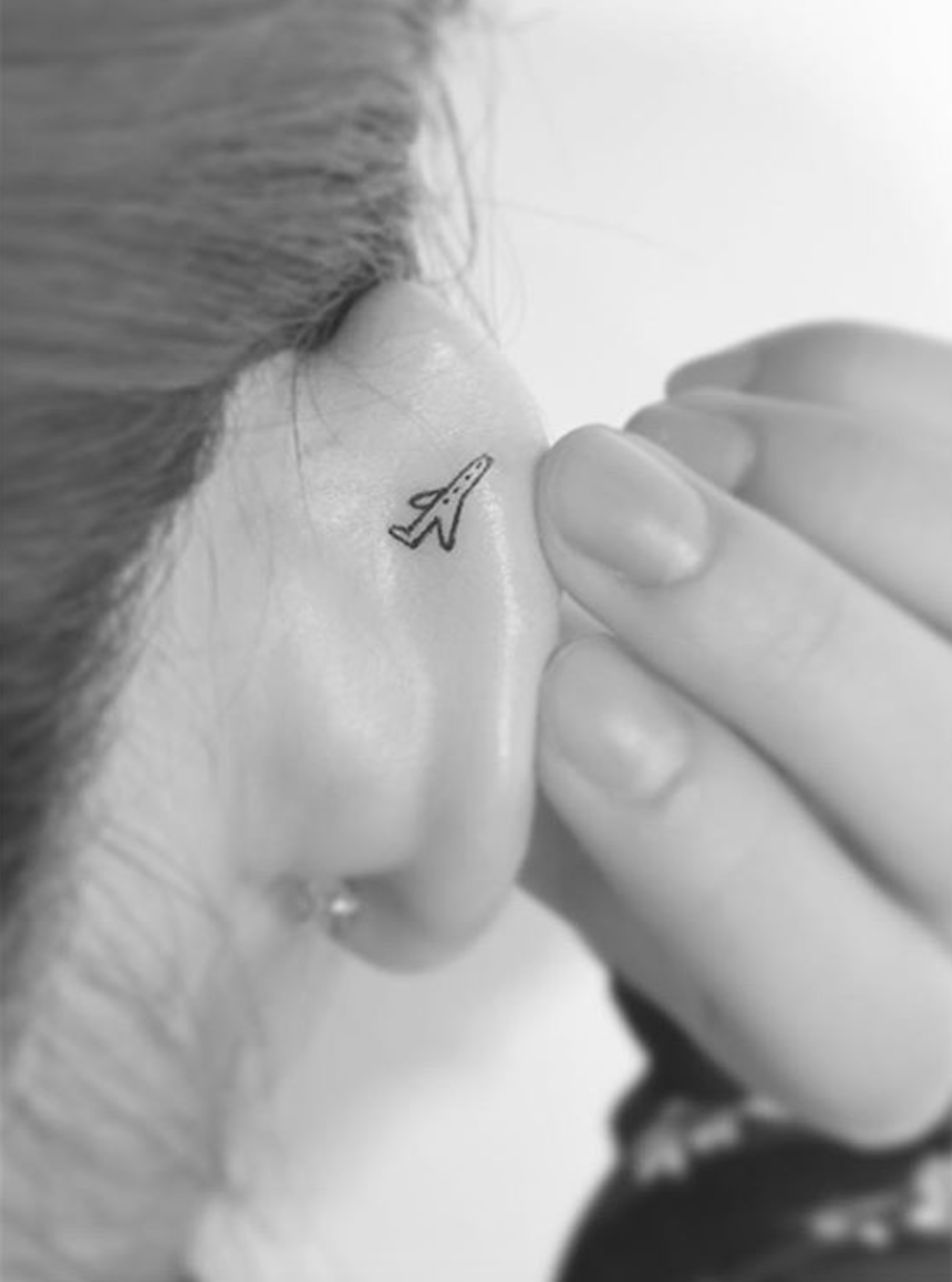 We’d love to fly away with this tiny ear art