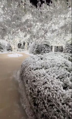 <p>Kim Kardashian/Instagram</p> The reality star covered every inch of her yard with a layer of fake snow.