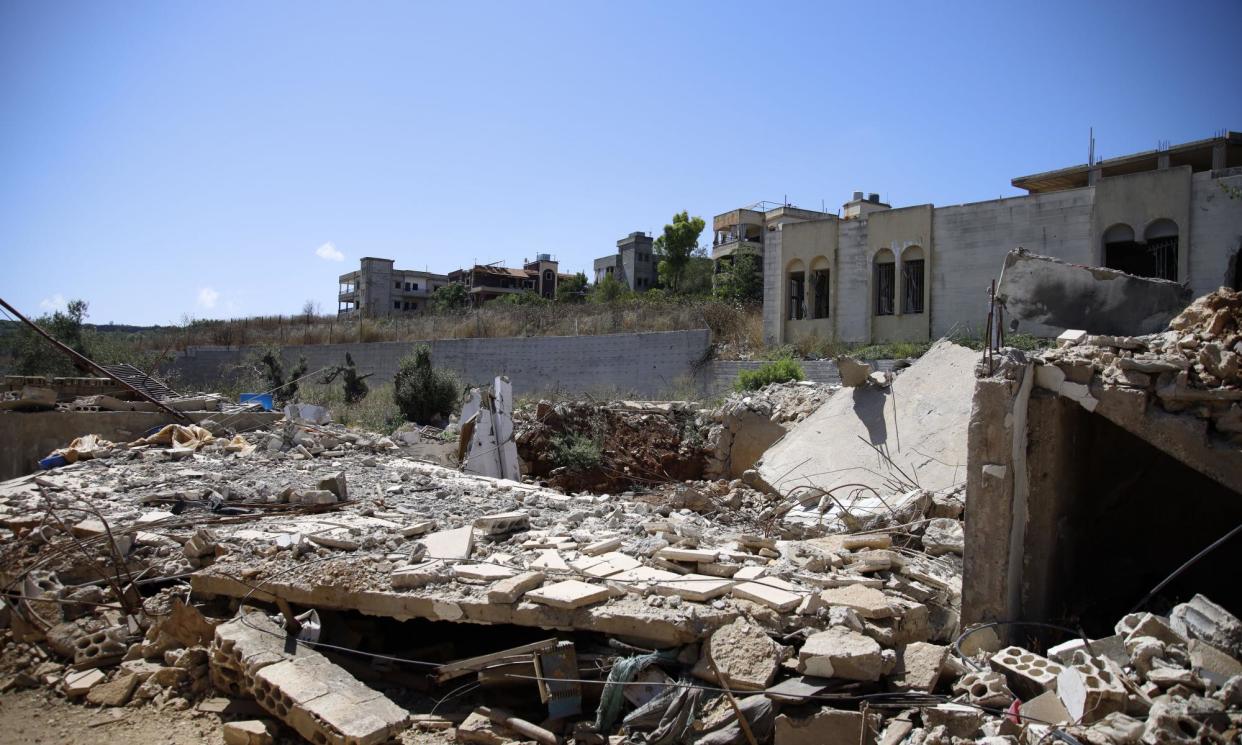 <span>A building destroyed by an Israeli airstrike in Houla, Lebanon.</span><span>Photograph: Xinhua/Rex/Shutterstock</span>