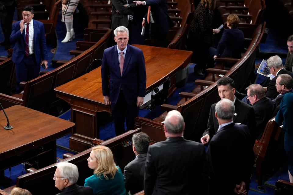 House Republican Leader Kevin McCarthy of Calif., arrives on the House floor before Ukrainian President Volodymyr Zelenskyy addresses Congress in Washington, Wednesday, Dec. 21, 2022.