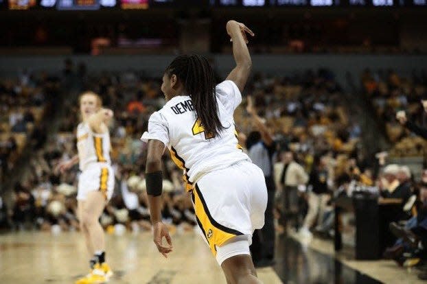 Missouri's Mama Dembele (4) celebrates after draining a 3-pointer during the Tigers' upset of No. 1 overall South Carolina on Thursday at Mizzou Arena.