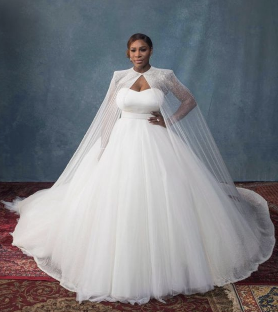 <p>The tennis great walked down the aisle wearing a strapless Sarah Burton for Alexander McQueen princess ball gown and veil.</p>