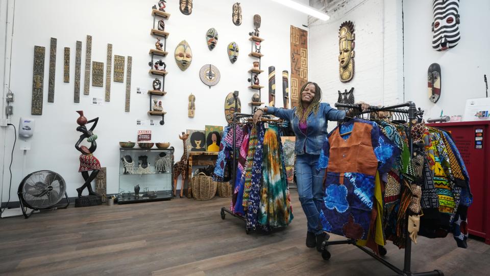USA Attitude by Aishata is a shop run by Aishata Seyeed and her husband, Ibrahim Seyeed, who is from Ghana. Many of the wooden items in the shop were carved by Ibrahim while Aishata produces the clothing items. Their shop is at the 400 W. Rich studios.