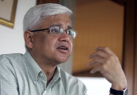 Author Amitav Ghosh speaks during an interview with Reuters at a hotel in New Delhi June 15, 2008. REUTERS/Danish Ismail/Files