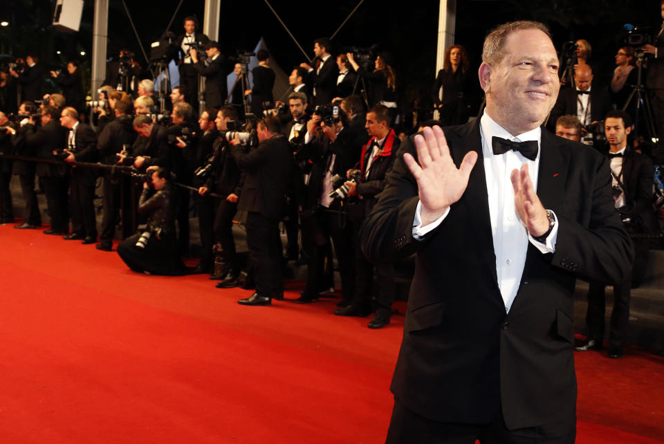 Producer Harvey Weinstein poses on the red carpet as he arrives for the screening of the film 