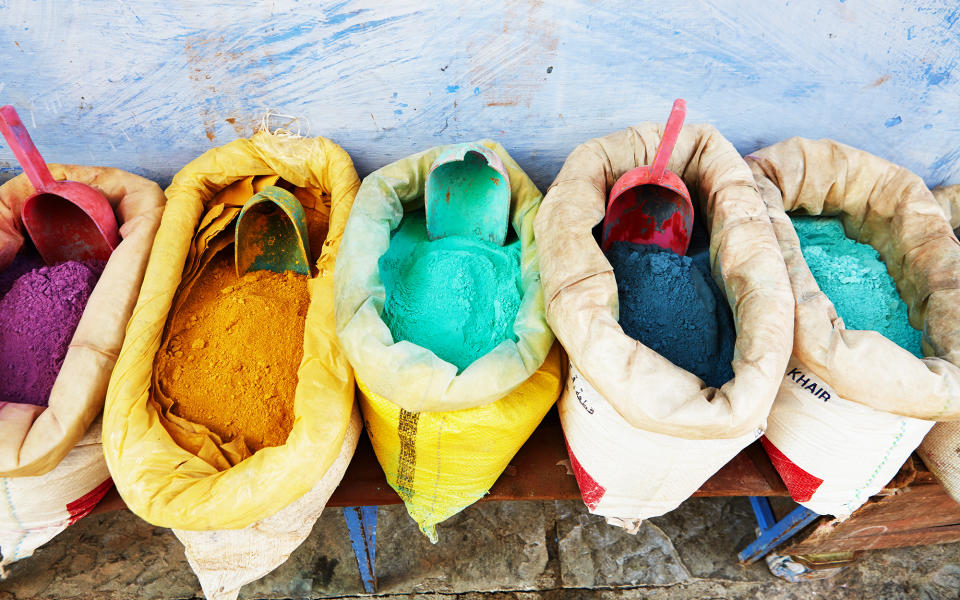 <p>Powdered pigments are sold along the side of the road. When mixed with water, they become the vibrant paints that cover the outside of the buildings of Chefchaouen.</p>