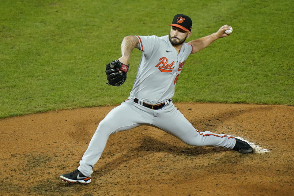 Baltimore Orioles' Tanner Scott pitches during the sixth inning of a baseball game against the Philadelphia Phillies, Tuesday, Aug. 11, 2020, in Philadelphia. (AP Photo/Matt Slocum)