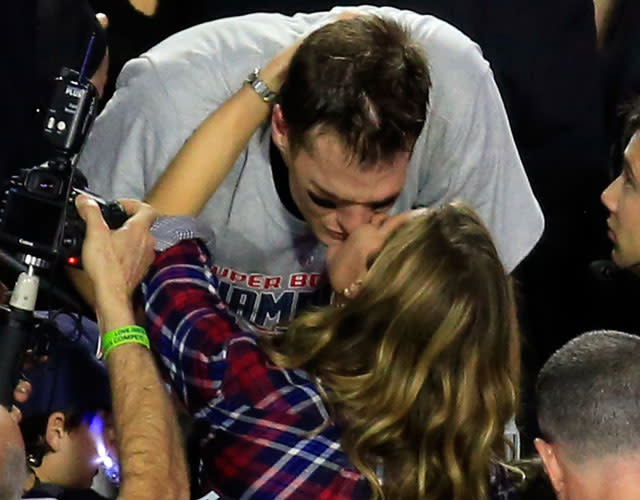 Tom Brady seems to be doing just fine despite his four-game NFL suspension. The Super Bowl winner's wife, supermodel Gisele Bundchen, wished him a happy birthday by sharing a photo of herself in a bikini, kissing her husband in the ocean while they each have one of their children on their shoulders. Daughter Vivian, 2, sat on top of Gisele, while 5-year-old son Benjamin climbed on top of Tom. <strong>PICS: Gisele Celebrates Tom Brady's Super Bowl Win with an Adorable Kiss </strong> "Happy birthday my love!" Gisele, 35, wrote. "We're so blessed to have you in our lives. Thank you for always giving us so much love. We love you!" Happy birthday my love! We're so blessed to have you in our lives. Thank you for always giving us so much love. We love...Posted by Gisele Bündchen on Monday, August 3, 2015 Tom turned 38 on Monday. The family also celebrated Tom's fourth Super Bowl win with kisses earlier this year when the New England Patriots prevailed over the Seattle Seahawks. Getty Images No doubt the couple is genetically perfect, but where do they fall on ET's list of the top five power couples? Watch the video below!