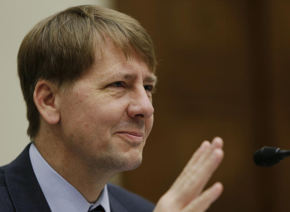 Consumer Financial Protection Bureau Director Richard Cordray testifies before the House Financial Services Committee in Washington September 12, 2013.  REUTERS/Gary Cameron  (UNITED STATES - Tags: POLITICS BUSINESS)