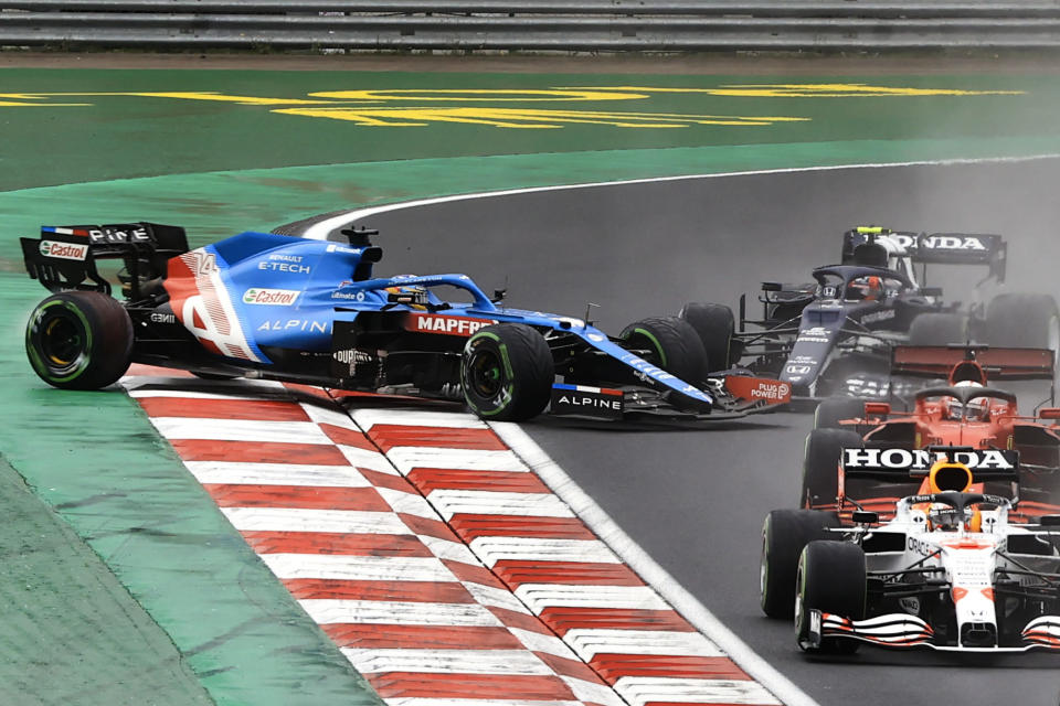 ISTANBUL, TURKEY - OCTOBER 10: Fernando Alonso of Alpine drives off track during Formula 1 Rolex Turkish Grand Prix 2021 in Istanbul, Turkey on October 10, 2021. The 16th race of the racing season is taking place at Intercity Istanbul Park on a 5.4-kilometer (3.4 miles) circuit with 58 laps. (Photo by Serhat Cagdas/Anadolu Agency via Getty Images)