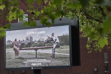 An electronic billboard advertisement encouraging Britons to vote ahead of the British EU referendum, is seen in London, Britain, May 26, 2016. REUTERS/Toby Melville