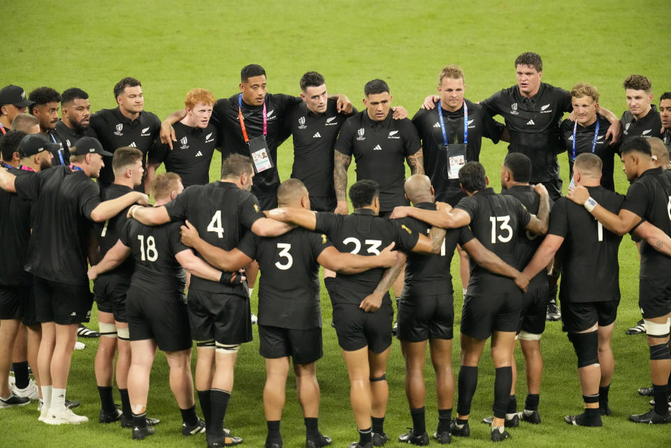 New Zealand players form a huddle after the Rugby World Cup Pool A match between France and New Zealand at the Stade de France in Saint-Denis, north of Paris, Friday, Sept. 8, 2023. France won the match 27-13.(AP Photo/Themba Hadebe)