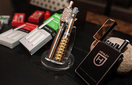 Various e-cigarette products for sale are seen at the Henley Vaporium in New York City December 18, 2013. REUTERS/Mike Segar