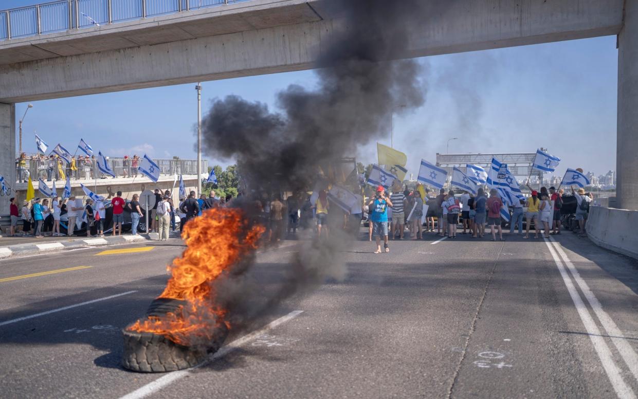 Protests on the Israeli costal road outside Kibbutz Yakum