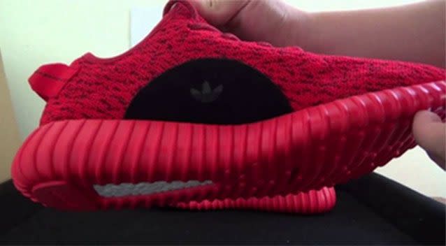 The armed robber was wearing the distinctive red Adidas runners. Picture: Victoria Police