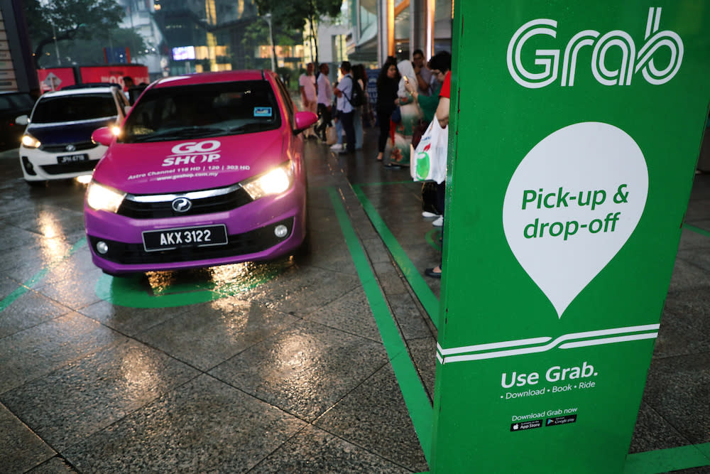 A Grab pick-up and drop-off station is seen at the entrance of Kuala Lumpur City Centre in Kuala Lumpur October 3, 2019. — Reuters pic