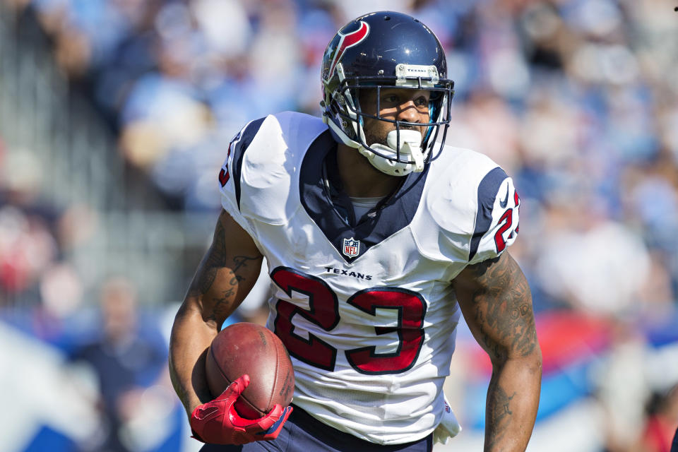 Arian Foster #23 of the Houston Texans runs the ball against the Tennessee Titans 