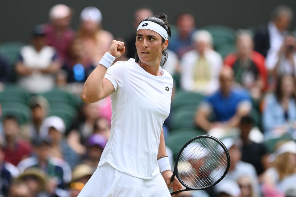 Ons Jabeur celebrates her victory over Diane Perry (AFP via Getty Images)