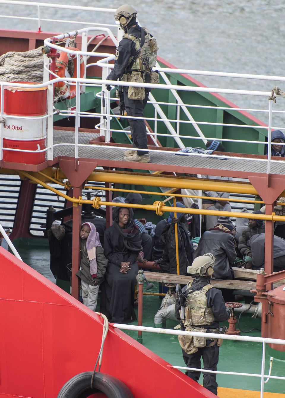 Armed forces stand onboard the Turkish oil tanker El Hiblu 1, which was hijacked by migrants, in Valletta, Malta, Thursday March 28, 2019. A Maltese special operations team on Thursday boarded a tanker that had been hijacked by migrants rescued at sea, and returned control to the captain, before escorting it to a Maltese port. (AP Photo/Rene' Rossignaud)