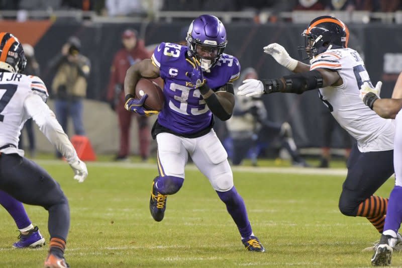 Veteran running Dalvin Cook (C) went to four-consecutive Pro Bowls with the Minnesota Vikings. File Photo by Mark Black/UPI