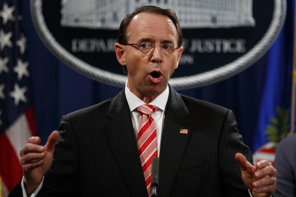 Deputy Attorney General Rod Rosenstein holds a news conference at the Department of Justice on Friday. (Photo: Evan Vucci/AP)