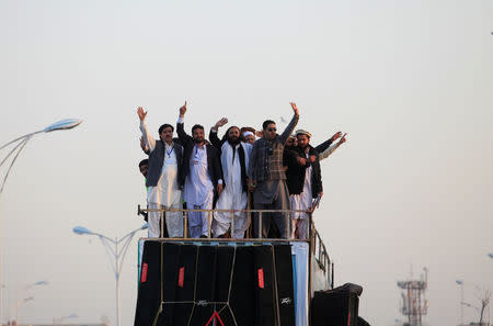 Members of the Pashtun community wave during a protest against what they say are enforced “disappearances” and routine oppression, in Islamabad, Pakistan February 1, 2018. REUTERS/Faisal Mahmood