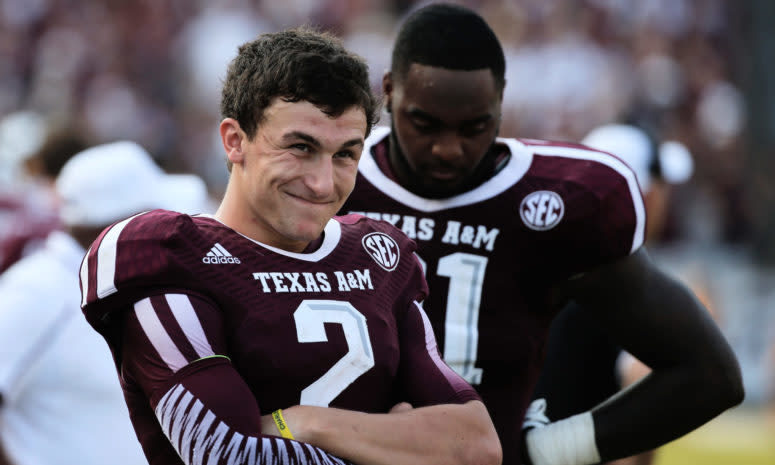 Johnny Manziel smiling in his Texas A&M football uniform.