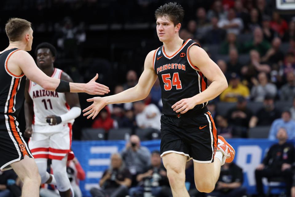 Princeton Tigers forward Zach Martini (54) reacts after scoring a basket against the Arizona Wildcats during the first half at Golden 1 Center.