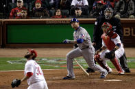 ST LOUIS, MO - OCTOBER 27: Josh Hamilton #32 of the Texas Rangers hits a two-run home run in the 10th inning off of Jason Motte #30 of the St. Louis Cardinals during Game Six of the MLB World Series at Busch Stadium on October 27, 2011 in St Louis, Missouri. (Photo by Rob Carr/Getty Images)