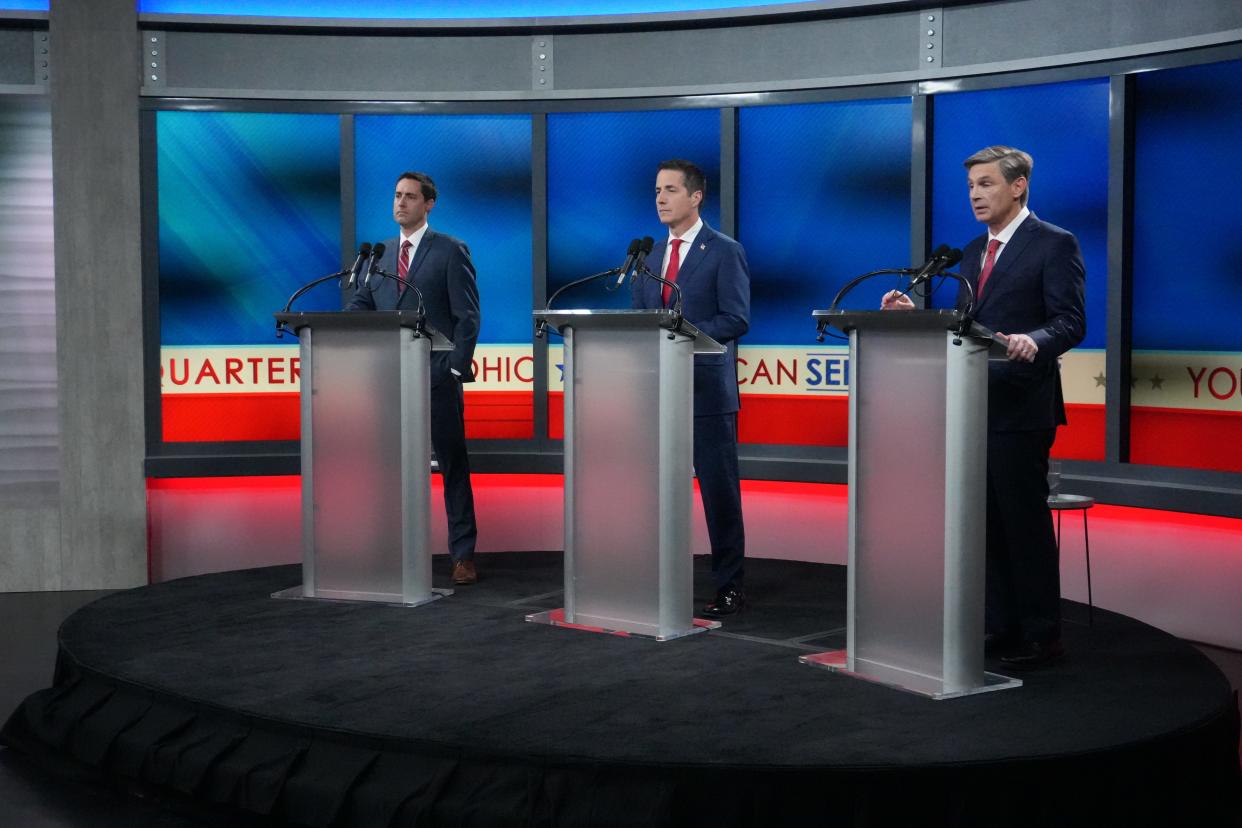 Ohio U.S. Senate candidates Secretary of State Frank LaRose, Cleveland businessman Bernie Moreno and state Sen. Matt Dolan take part in a Republican debate at Fox 8 studio in Cleveland on Jan. 22