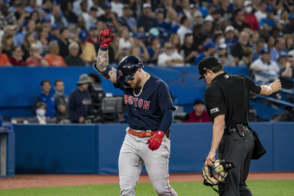 Boston Red Sox's Alex Verdugo (99) celebrates after hitting a home run against the Toronto Blue Jays during the sixth inning of a baseball game Wednesday, June 29, 2022, in Toronto. (Christopher Katsarov/The Canadian Press via AP)