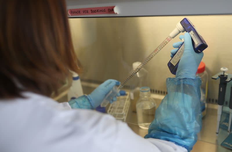 A scientist works in the lab at the Roslin Institute in Edinburgh, Scotland