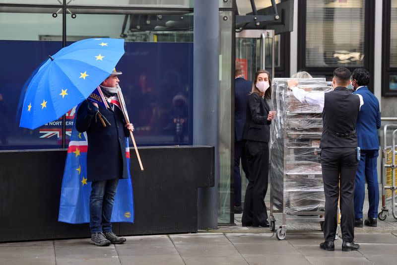 Anti-Brexit protester Steve Bray looks on as food is delivered to the venue where EU and British trade deal negotiations are taking place, in London