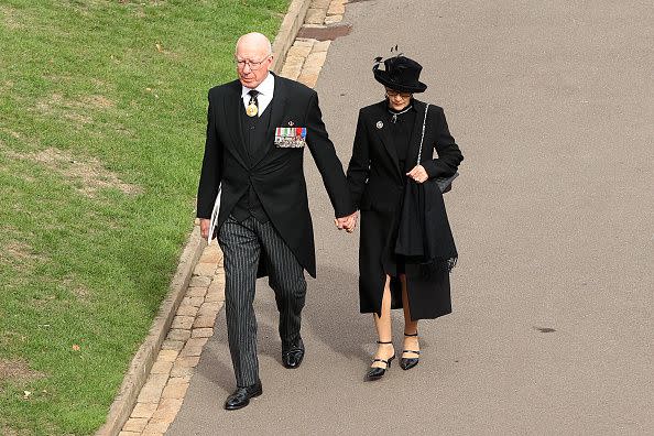 WINDSOR, ENGLAND - SEPTEMBER 19: Governor-General of Australia, David Hurley and Linda Hurley arrive at The Committal Service for Queen Elizabeth II at Windsor Castle on September 19, 2022 in Windsor, England. The committal service at St George's Chapel, Windsor Castle, took place following the state funeral at Westminster Abbey. A private burial in The King George VI Memorial Chapel followed. Queen Elizabeth II died at Balmoral Castle in Scotland on September 8, 2022, and is succeeded by her eldest son, King Charles III. (Photo by Ryan Pierse/Getty Images)