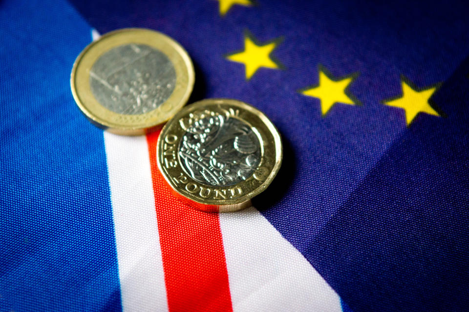 The flag of the EU on top of a larger Union Flag representing Britain. Photo: Getty