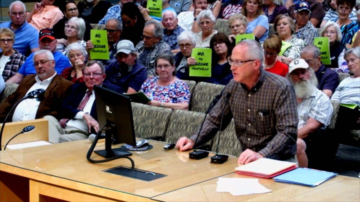 Kevin Dahl, the agent for Granite Yuma LLC, presents information on a proposed rezoning in Fortuna Foothills to the Yuma County Board of Supervisors on March 6, 2023.