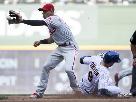 Jun 16, 2018; Milwaukee, WI, USA; Milwaukee Brewers left fielder Ryan Braun (8) steals second base as Philadelphia Phillies second baseman Cesar Hernandez (16) takes the throw in the fifth inning at Miller Park. Mandatory Credit: Benny Sieu-USA TODAY Sports