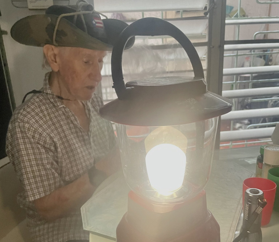 Priscila Roman-Ortiz's 91-year-old grandfather depended on battery-powered lamps while power was out.