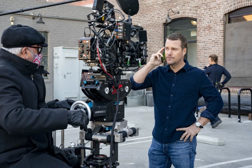 Behind the scenes on the set of the CBS show NCIS: Los Angeles as they practice social distancing and Covid safety protocols in December of 2020. Episode is "The Frogman's Daughter" – Pictured Behind the Scenes: Chris O'Donnell (Special Agent G. Callen). When Sam's daughter, Kam (Kayla Smith), is kidnapped after leading citywide protests, he will stop at nothing to find her. Also, Deeks rejoins NCIS and Callen searches for answers about Anna, on NCIS: LOS ANGELES, Sunday, Feb. 14 (9:00-10:00 PM, ET/PT) on the CBS Television Network. Photo: Ron Jaffe/CBS ©2020 CBS Broadcasting, Inc. All Rights Reserved.