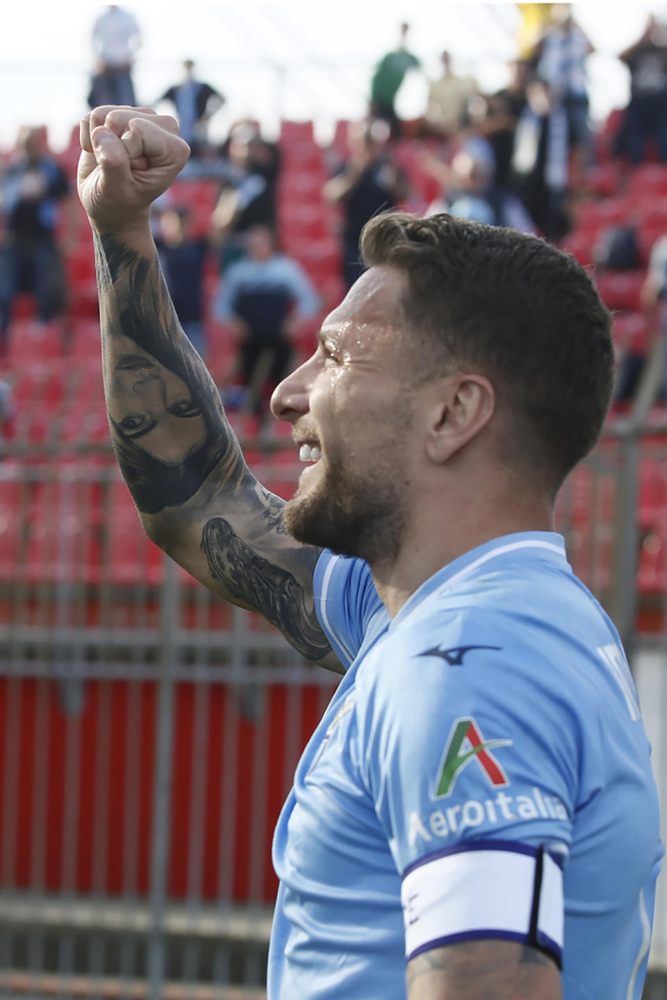 Lazio's Ciro Immobile celebrates after scoring their side's first goal of the game during the Serie A soccer match between Monza and Lazio at the U-Power Stadium in Monza, Italy, Saturday May 4 , 2024. (Alberto Mariani/LaPresse via AP)