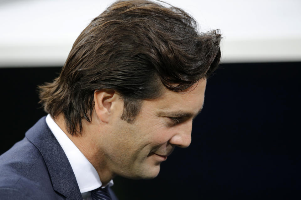 Real Madrid's coach Santiago Solari enters from the tunnel before a Spanish La Liga soccer match between Real Madrid and Valencia at the Santiago Bernabeu stadium in Madrid, Spain, Saturday, Dec. 1, 2018. (AP Photo/Paul White)