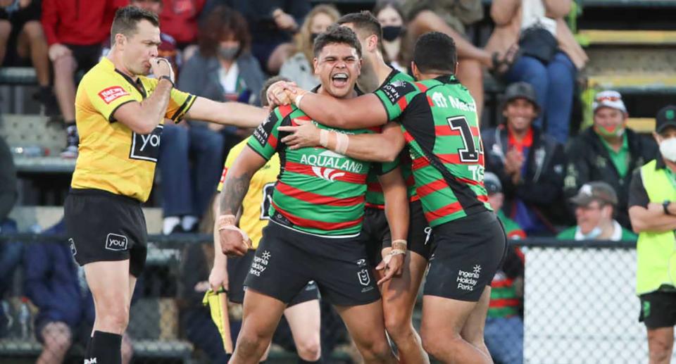 Latrell Mitchell of the Rabbitohs celebrates scoring a try during the round 19 NRL match between the South Sydney Rabbitohs and the New Zealand Warriors at Sunshine Coast Stadium.