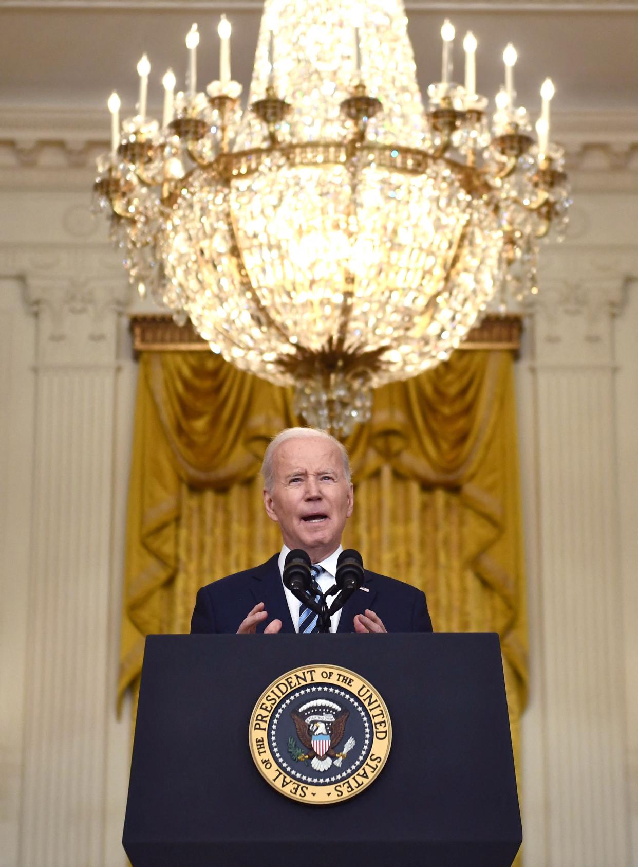 U.S. President Joe Biden addresses the Russian invasion of Ukraine from the East Room of the White House on Feb. 24, 2022, in Washington, DC. Biden on Thursday announced severe new sanctions on Russia in response to the invasion of Ukraine, including freezing assets of major banks and cutting off high-tech exports to the country. "This is going to impose severe cost on the Russian economy, both immediately and over time," Biden said.