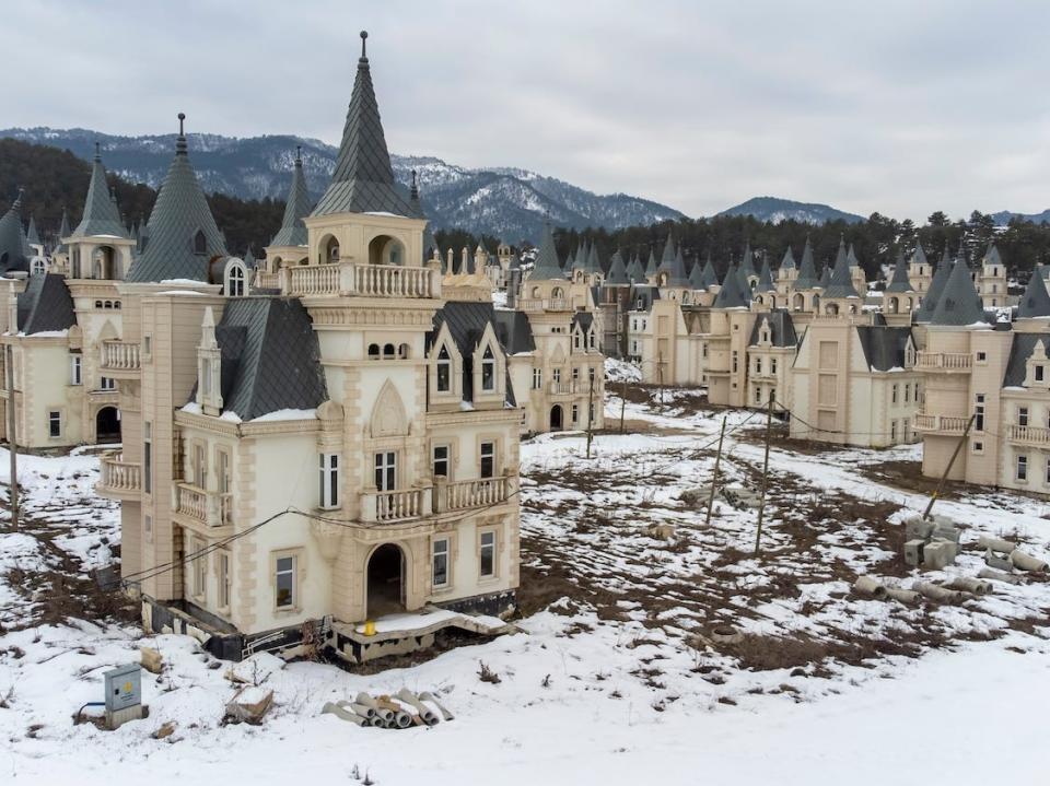 A view of the homes coated in snow.