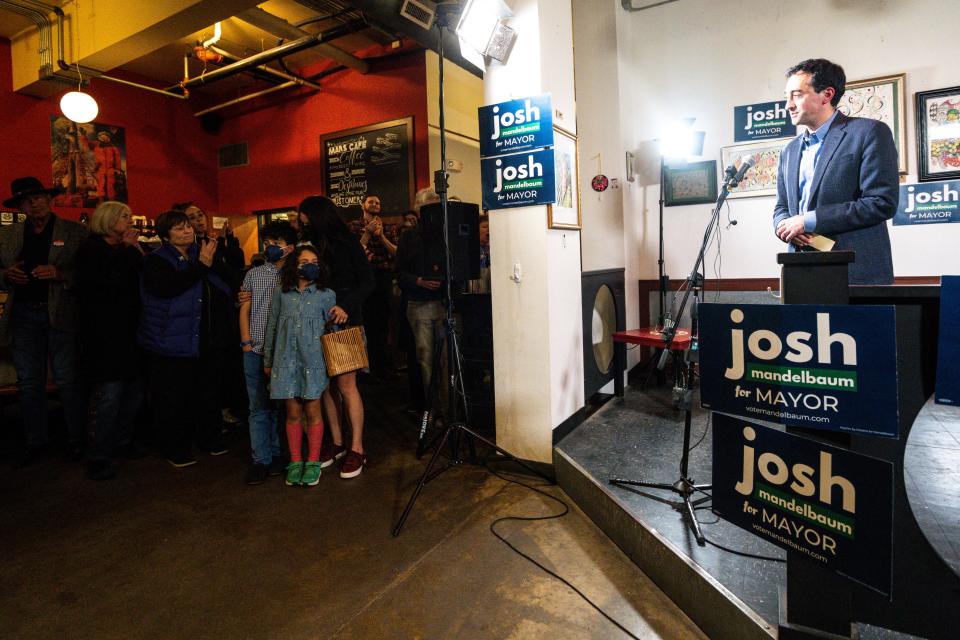 Des Moines mayoral candidate Josh Mandelbaum looks to his family, left, during his concession speech at his watch party at Mars Care on Tuesday, Nov. 7, 2023, in Des Moines.