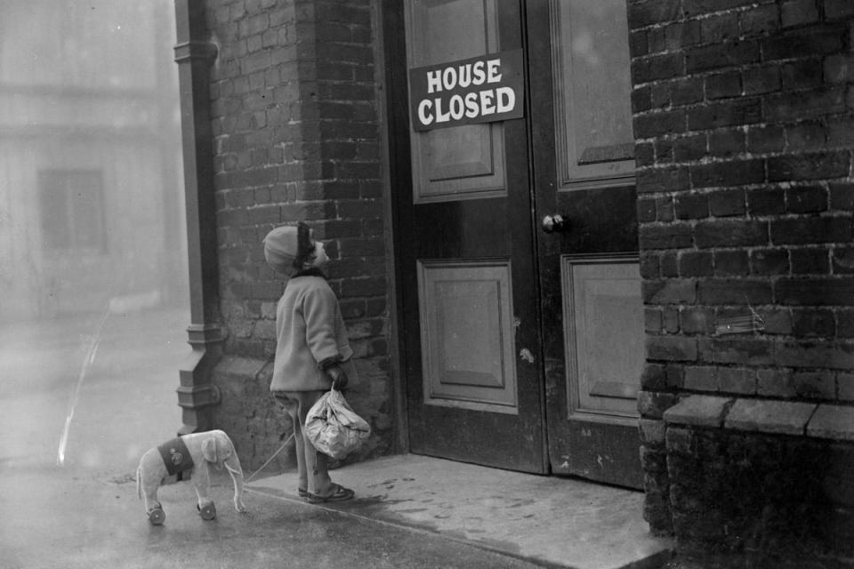 1927: Just me and my toy elephant: A young visitor and her toy elephant find the elephant house at the zoo closed for the winter holidays (Fox Photos/Getty Images)