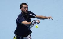 Britain Tennis - Barclays ATP World Tour Finals - O2 Arena, London - 14/11/16 Croatia's Marin Cilic goes over ad boards during his round robin match against Great Britain's Andy Murray Reuters / Stefan Wermuth Livepic